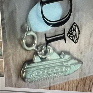 DI Diamond International Cruise Ship Charm Sealed New Gold Tone